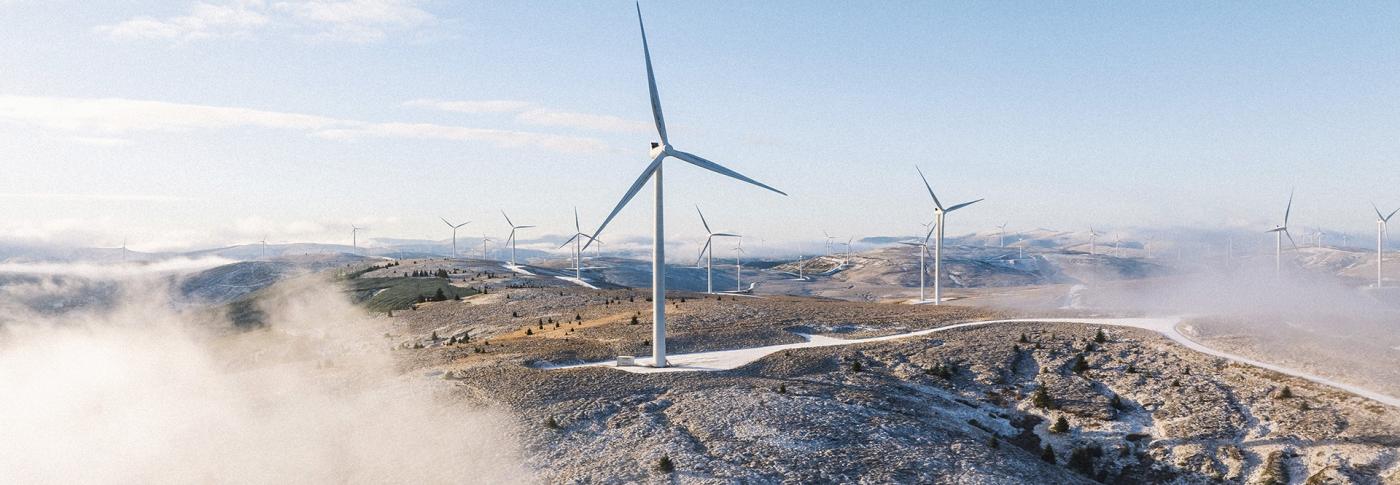 wind turbines across top of mountains