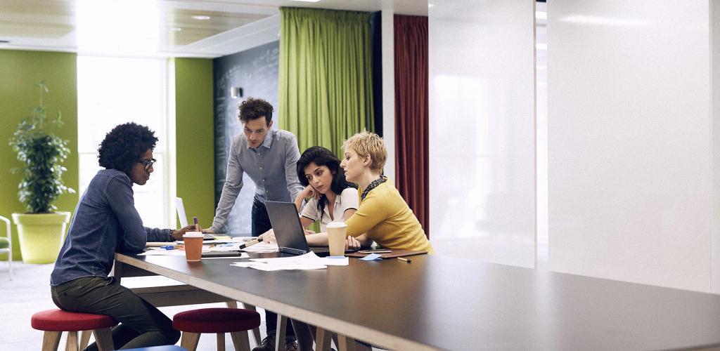 Group of people collaborating working together