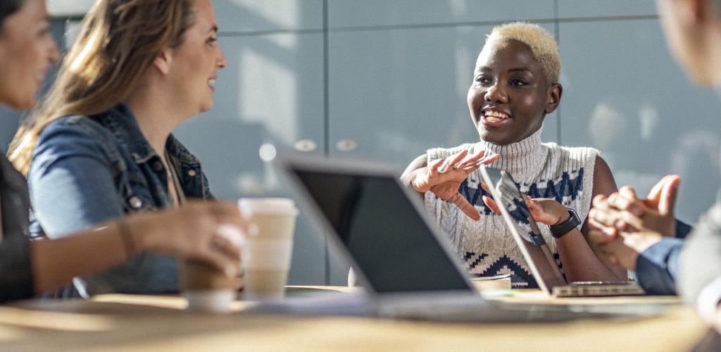 happy team working together in meeting