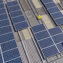 Solar panel installation on factory roof