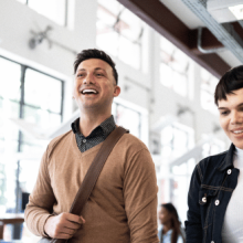 People walking through office