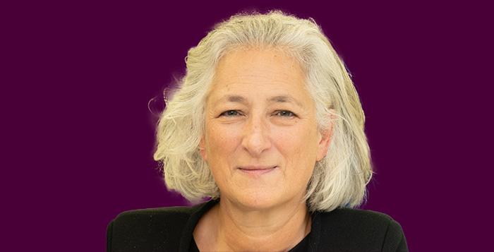 Siobhan Duffy headshot on purple background